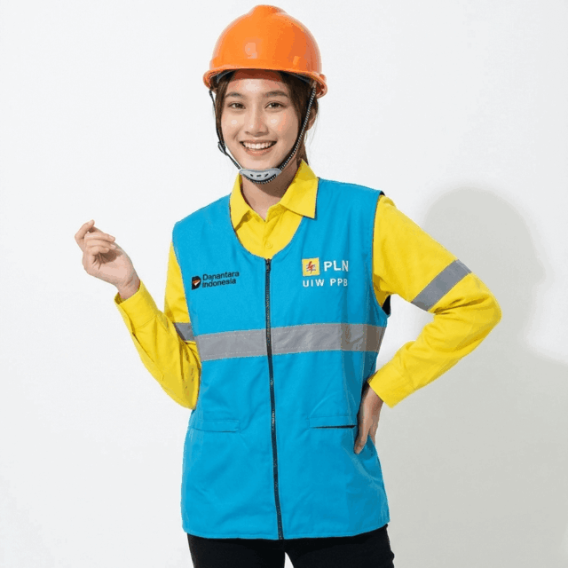 Foto rompi safety PLN warna biru turkis bahan taslan hasil produksi Djava Konveksi
